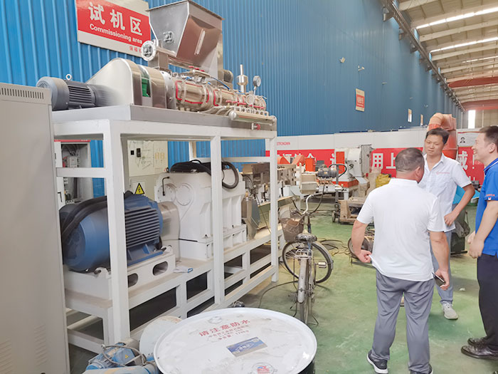 Customers visits our factory for feed making machines